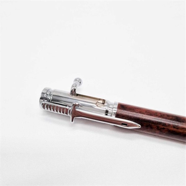 Wooden bullet pen with chrome clip detail.