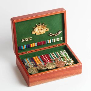 Medium sized medal box made from australian jarrah wood, open to display medals.