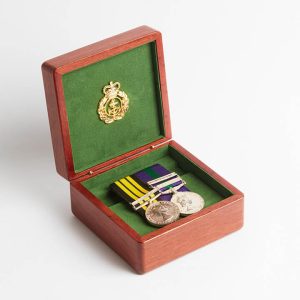 Wooden medal box byMurphy's, made from australian jarrah wood, open to display medals.