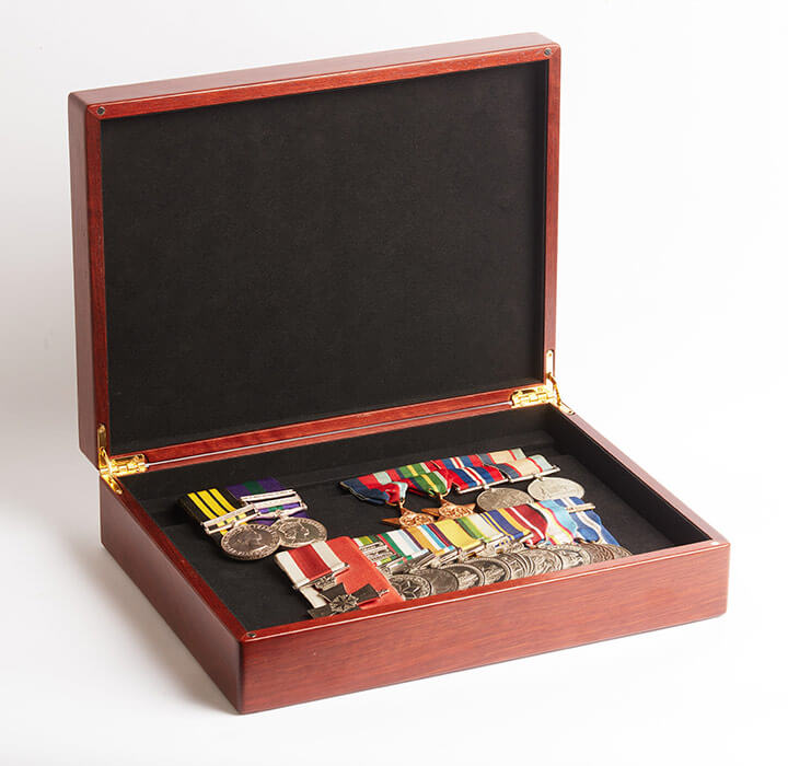 A4 medal presentation boxes, opened up to showcase medals.
