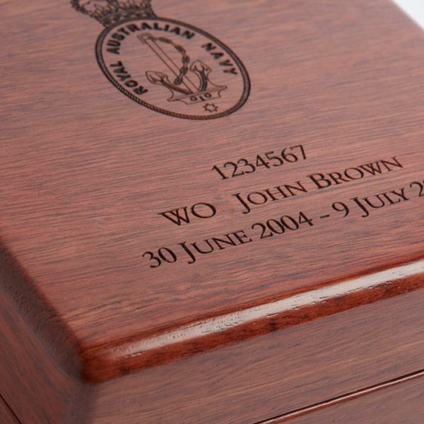 Close up of military engraving on a small medal box by Murphy's.