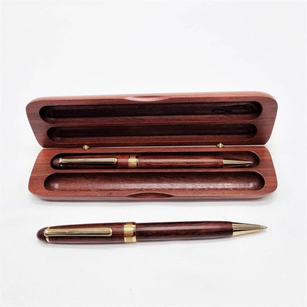 Double pen set case with ballpoint pen inside and rollerball pen lying in front.