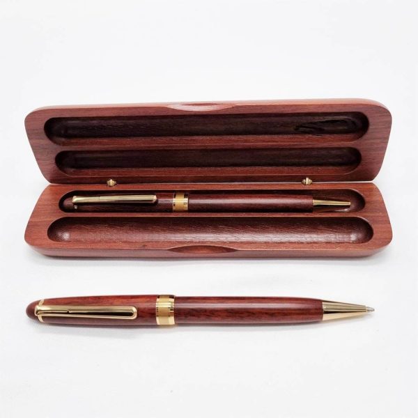 Jarrah wooden double pen set case with ballpoint pen inside and pencil lying in front.