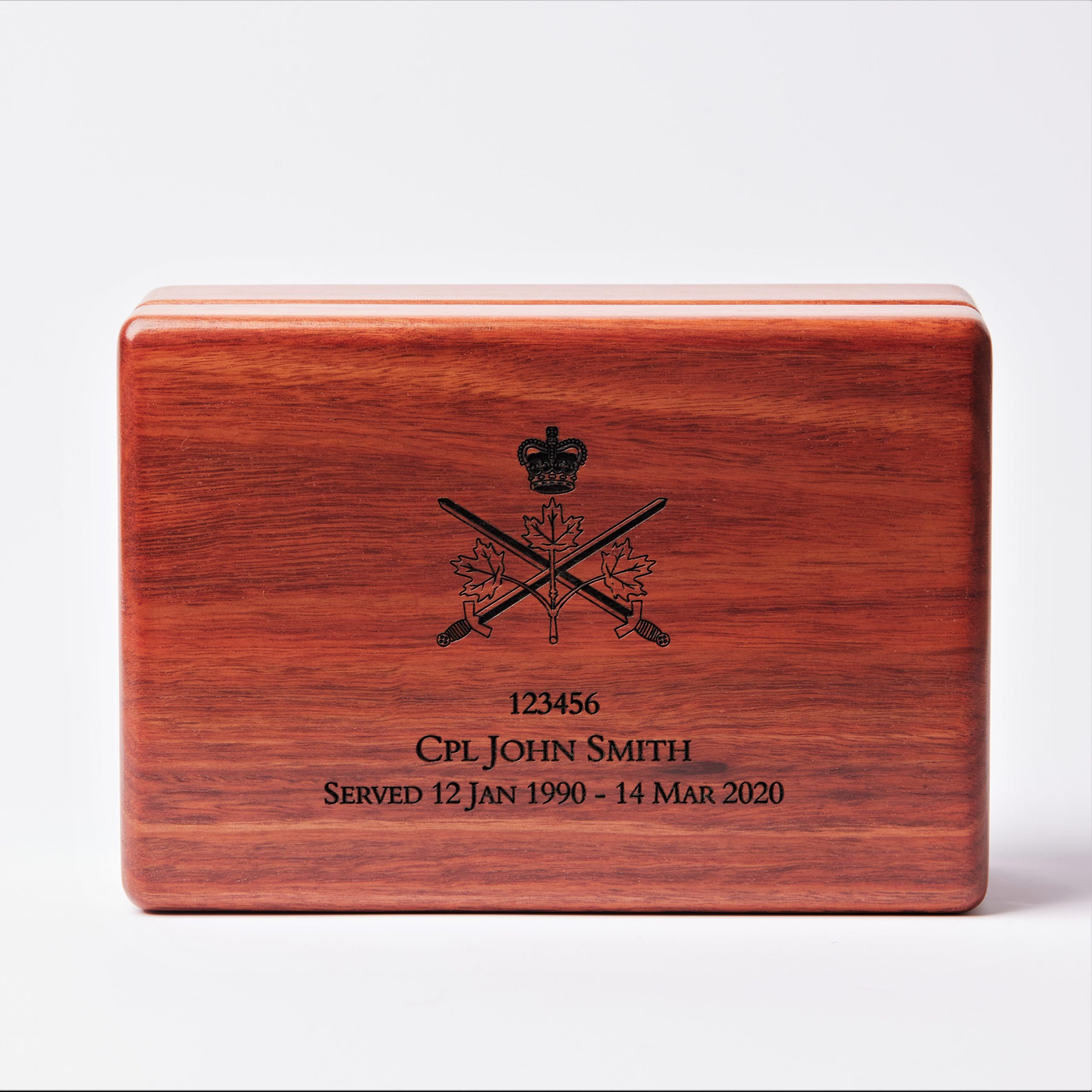 A medium medal display case by Murhpy's of Healesville, built from Australian hardwood and engraved with a military emblem from canada.
